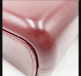 Chanel Gabrielle opposite leather lower corner with visible wear