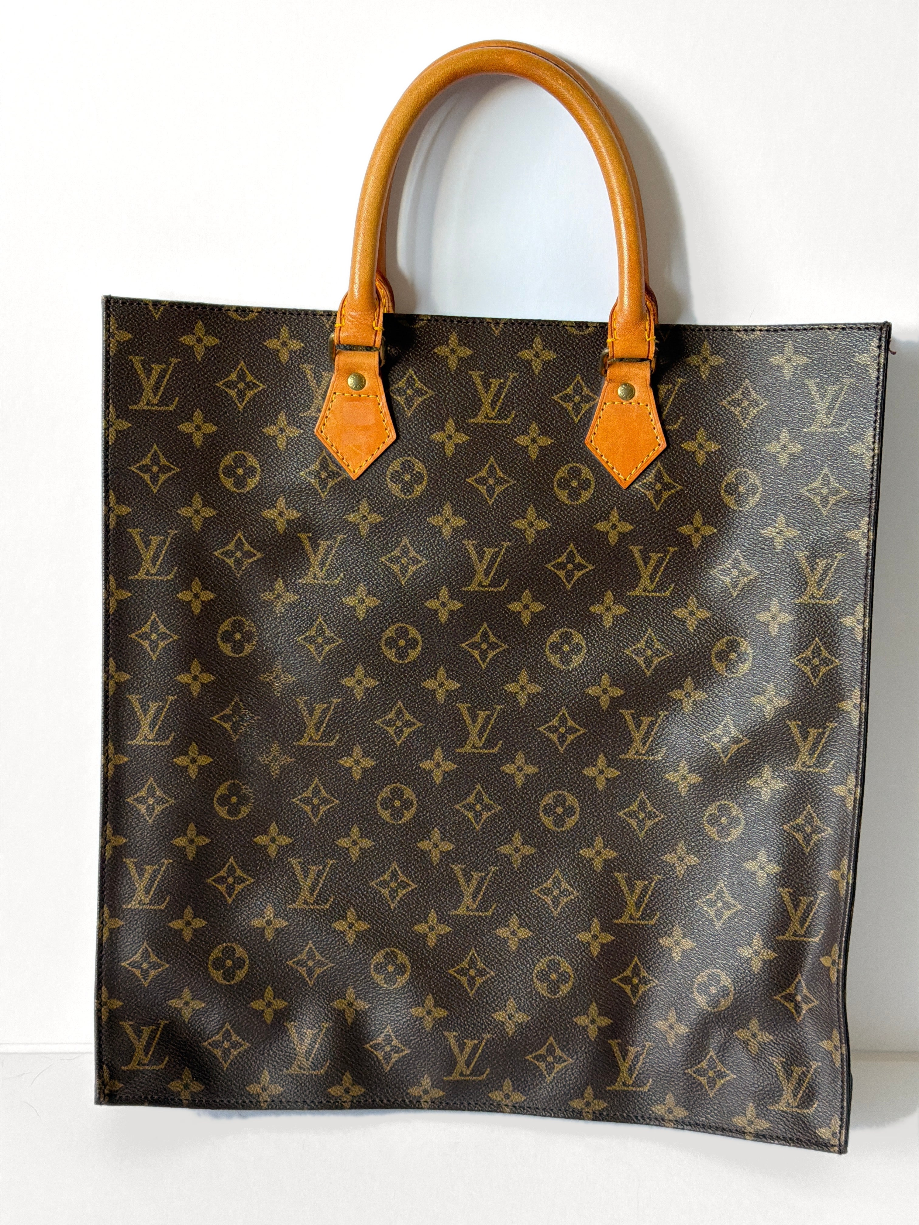 Louis Vuitton Monogram Sac Plat Tote Bag M51140 front view on TTS pearl-white background