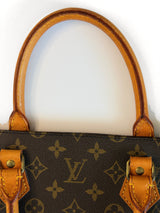 Louis Vuitton Monogram Sac Plat Tote Bag M51140 handle attachment detail on TTS pearl-white background